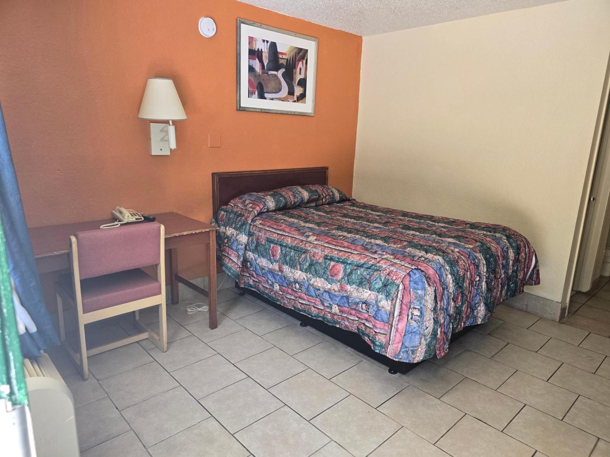 Carpet Inn Опелика Екстериор снимка